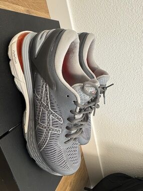ASICS Gray Athletic Running Shoes with Orange Heel Accent
